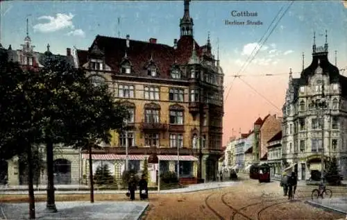 Ak Cottbus Niederlausitz, Berliner Straße, Geschäftshäuser, Straßenbahn