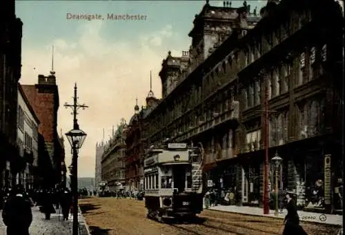 Ak Manchester England, Deansgate,  Straßenansicht, Straßenbahn, historische Architektur