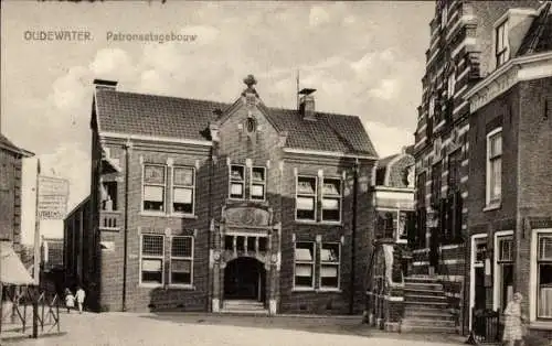 Ak Oudewater Utrecht Niederlande, Patronaatsgebouw, historische Architektur, Stadtszene, Postk...