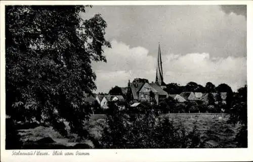 Ak Stolzenau an der Weser, Stolzenau/Wesec, Blick auf die Dorfansicht, Kirche im Hintergrund