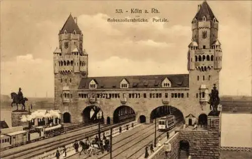 Ak Köln am Rhein, Hohenzollernbrücke, Portale, historische Ansicht, Bahngleise, Pferdebahn, Türme