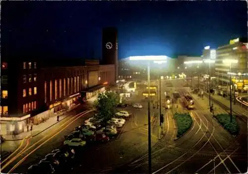 Ak Düsseldorf am Rhein, Nachtansicht, Hauptbahnhof, beleuchtete Straßen, Straßenbahn