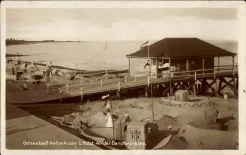 Ak Ostseebad Kellenhusen in Holstein, Ostseebad  Dampferbrücke, Strand, Holzhütte, Sanddünen, ...