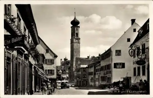 Ak Isny im Allgäu, Lindauerstraße, Uhrturm, historische Architektur, Blumenladen