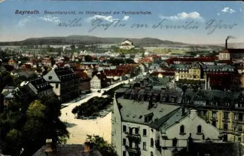 Ak Bayreuth in Oberfranken, Gesamtansicht, Festspielhalle im Hintergrund, farbenfrohe Darstellung