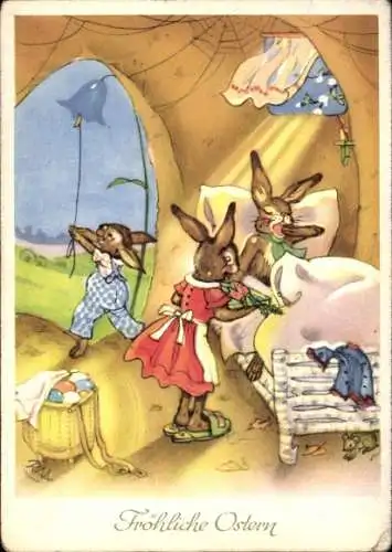 Künstler Ak Glückwunsch Ostern, Osterhasen-Familie, Ostereier