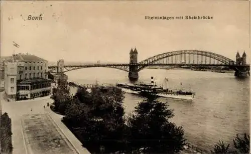 Ak Bonn am Rhein, Stadtansicht mit Rheinbrücke, Rheinanlagen, Schiff auf dem Rhein