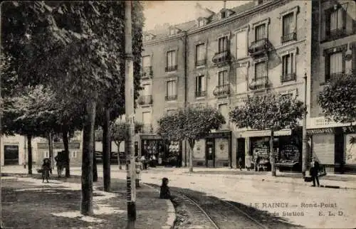 Ak Le Raincy Seine Saint Denis, Stadtansicht, Rundplatz, Gebäude mit Balkonen, Straßenbahnglei...