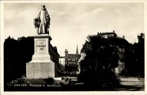 Ak Arezzo Toscana, Denkmal von Guido Monaco auf der Piazza G. Monaco in  dahinter die Basilica...