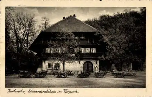 Ak Karlsruhe in Baden, Schwarzwaldhaus, Tierpark, zweigeschossiges Gebäude, Tische im Freien