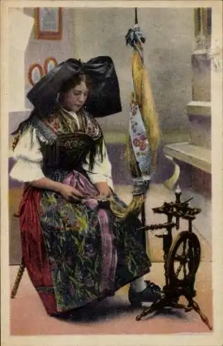Ak Barr Elsass Bas Rhin, Eine junge Frau in elsässischer Tracht sitzt an einem Spinnrad und sp...