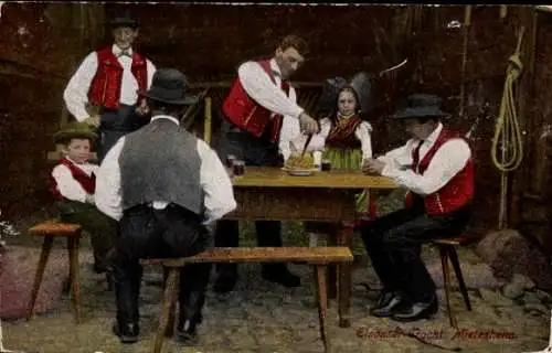 Ak Familie in Elsässer Tracht isst zu Tisch, Gugelhupf