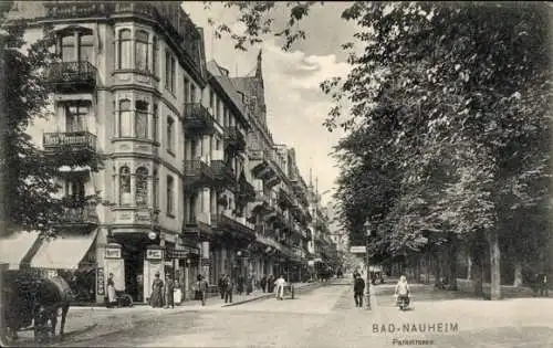 Ak Bad Nauheim in Hessen, Straße mit Gebäuden, Bäumen, Personen, Pferd und Wagen