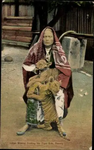 Ak Penang Malaysia, Indian Women feeding the Tiger Kids