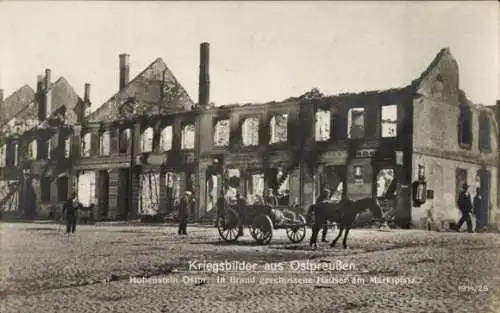 Ak Olsztynek Hohenstein Ostpreußen, Kriegsschäden, ausgebrannte Häuser, Pferde und Wagen