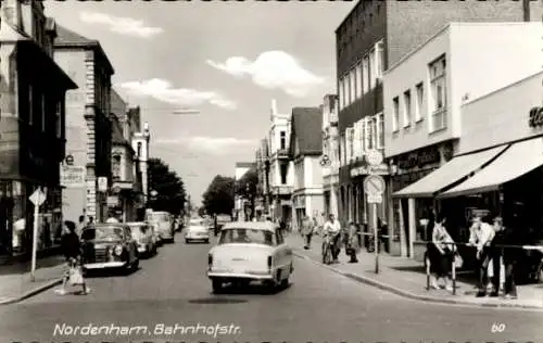 Ak Nordenham in Oldenburg Niedersachsen, Bahnhofstraße, Stadtansicht, Autos, ehemalige Geschäfte