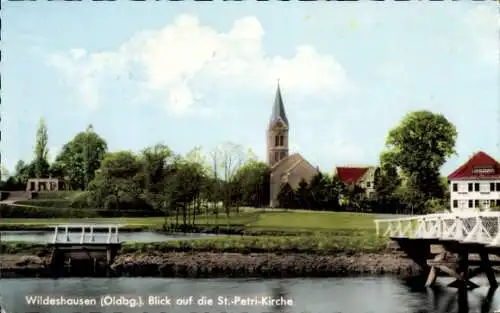 Ak Wildeshausen in Oldenburg, Blick auf die St.-Petri-Kirche, Landschaft mit Bäumen und Wasser...