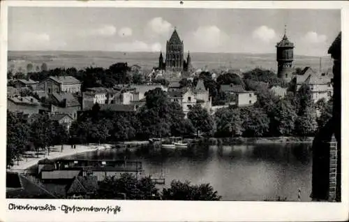 Ak Oberwesel am Rhein, Blick auf die Stadt, Kirche, Wasser, Bäume, Wolken