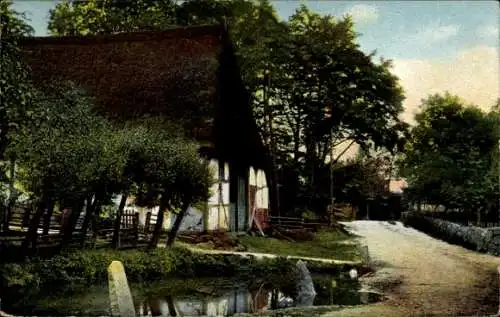 Ak Ehestorf Rosengarten Kreis Harburg, Straßenpartie mit Blick auf ein Bauernhaus mit Reetdach
