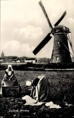 Ak Zeeland, Waschtag, Frauen in niederländischer Volkstracht, Windmühle