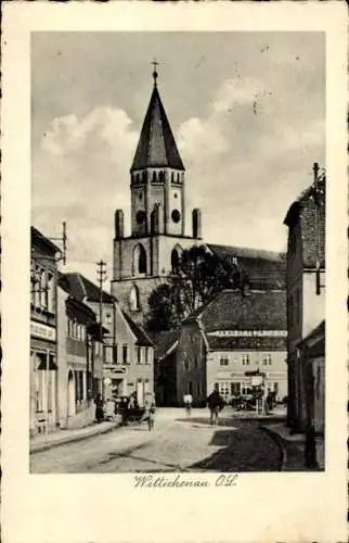 Ak Wittichenau in der Oberlausitz, Straßenpartie, Kirche