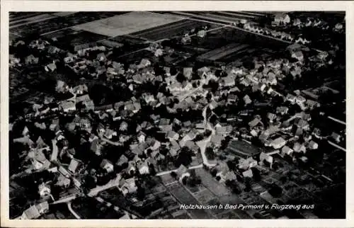 Ak Holzhausen Bad Pyrmont in Niedersachsen, Luftaufnahme von Holzhausen, viele Häuser, ländliche 