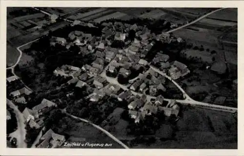 Ak Zeilfeld Römhild in Thüringen, Luftaufnahme von  Wohnhäuser, landwirtschaftliche Flächen
