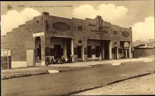 Ak Jadotville Likasi DR Kongo Zaire, Gebäude der Kompanie d'élevage et d'alimentation, Persone...
