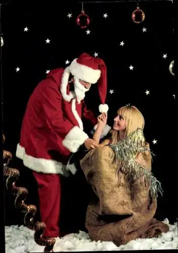 Ak Weihnachten, Weihnachtsmann, Frau im Sack