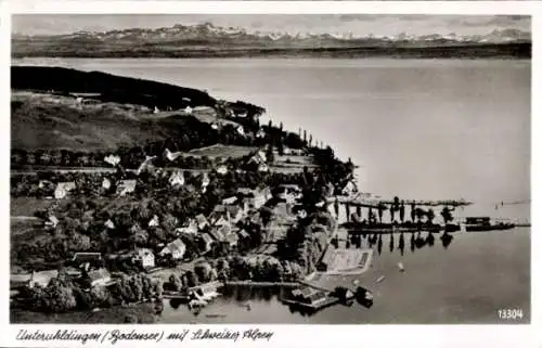 Ak Unteruhldingen Uhldingen Mühlhofen am Bodensee, Fliegeraufnahme, Schweizer Alpen