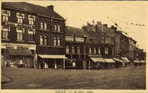 Ak Gilly Charleroi Wallonien Hennegau, Stadtansicht mit Geschäften, Schildern, Straßenbahnglei...