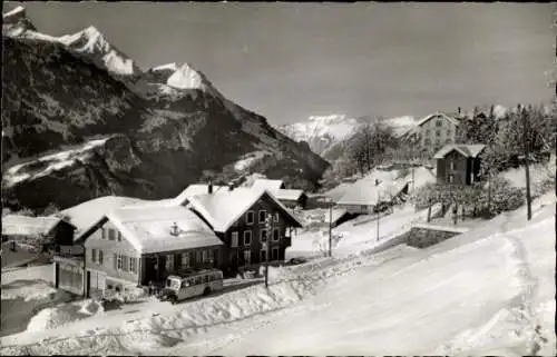 Ak Reuti Hasliberg Kanton Bern Schweiz, Schneebedeckte Landschaft, Berge, Häuser, Winter