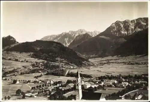 Ak Pfronten im Allgäu, Blick auf Pfronten im Allgäu mit der Kirche St. Nikolaus.