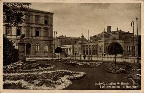 Ak Ludwigshafen am Rhein, Schillerdenkmal, Bahnhof, Gartenanlage, historische Gebäude