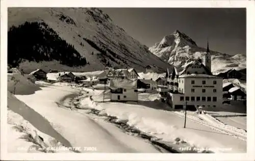 Ak Galtür in Tirol, Berglandschaft, Schnee, Häuser, Kirchturm, Ballunapitze
