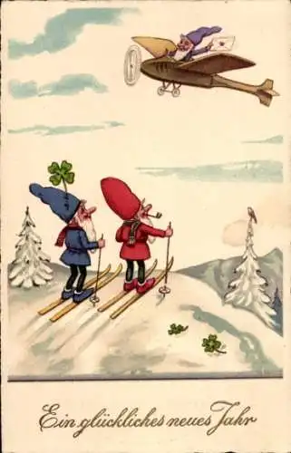 Künstler Ak Baumgarten, Fritz, Glückwunsch Neujahr, Zwerge auf Skiern und im Flugzeug, Kleeblätter