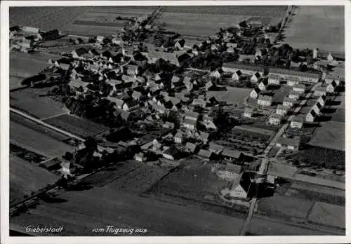 Ak Giebelstadt in Unterfranken, Luftaufnahme von  Ackerflächen, Wohnhäuser