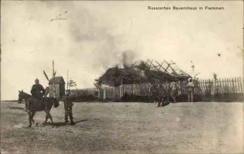 Ak Russland, russisches Bauernhaus in Flammen