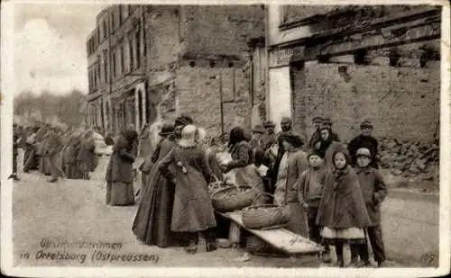 Ak Szczytno Ortelsburg Ostpreußen, Frauen mit Körben, Kinder, Ruinen, historische Szenerie, Os...