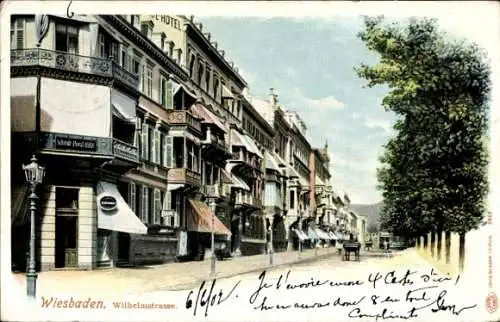 Ak Wiesbaden in Hessen,  Wilhelmstraße, Hotel, Straßenszenen, historische Architektur, Kutschen