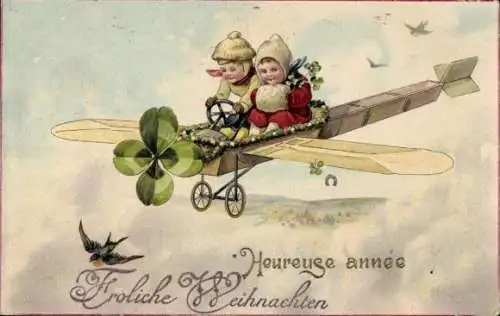 Ak Frohe Weihnachten, Fröhliches Neujahr, Kinder im Flugzeug, Kleeblatt, Schwalbe