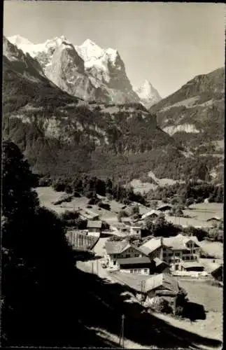 Ak Goldern Hasliberg Kt. Bern Schweiz, Berglandschaft, Häuser im Tal, schneebedeckte Gipfel