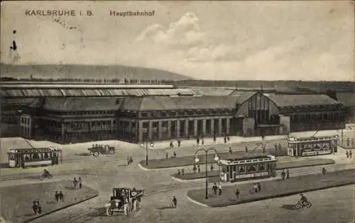 Ak Karlsruhe in Baden, Karlsruhe Hauptbahnhof, Bahnhofsgebäude, Straßenbahn,  Fahrzeuge