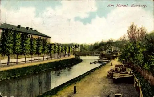 Ak Bamberg in Oberfranken, Am Kanal,  ruhige Wasserlandschaft, grüne Bäume, historische Gebäude