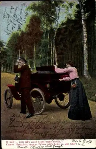 Ak Paar schiebt Automobil an
