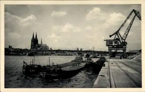 Ak Köln am Rhein, Hafen, Lastkahn und Schiff Ursula, Hebekran, Dom, Ausstellungsstempel