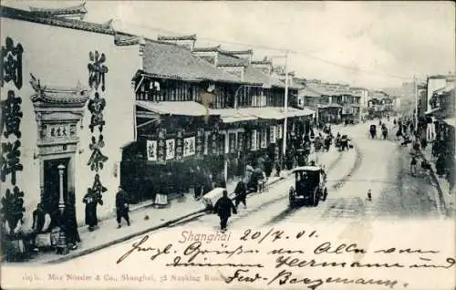 Ak Shanghai China, Straßenpartie, Eingangsportal