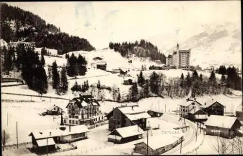 Ak Gstaad Saanen Kanton Bern, Schneelandschaft, Gebäude, Bäume, Berge,  