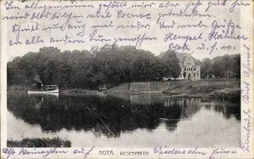 Ak Hoya an der Weser, Flusslandschaft, Boot auf dem Wasser, Gebäude im Hintergrund