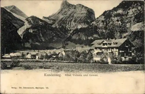 Ak Kandersteg Kanton Bern,  Hôtel Victoria und Gemmi, Berge im Hintergrund